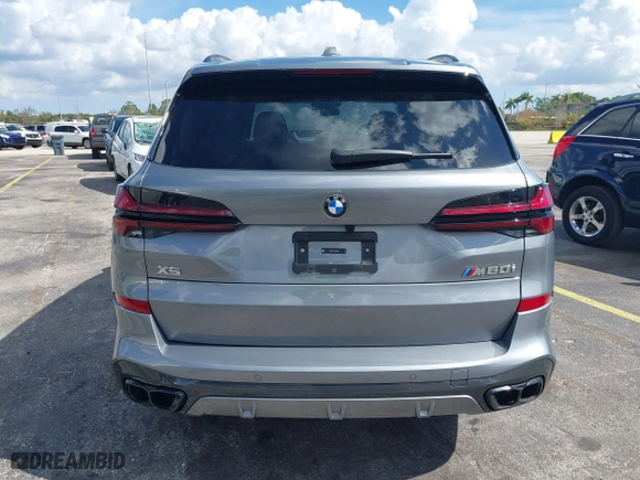 2025 BMW X5 M60i with VIN 5UX33EU03S9X62019, listed as a IAAI auction lot 41623189 with 5,749 mi miles. Bid and sale history available at carsss.com. Image 16.