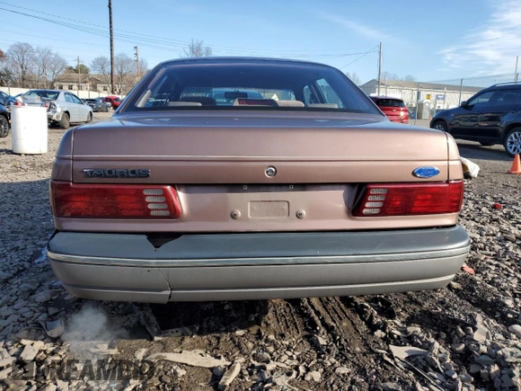 1989 Ford Taurus GL with VIN 1FABP52U1KA299938, listed as a Copart auction lot 86684144 with 52,675 mi miles and Salvage Title. Bid and sale history available at carsss.com. Image 6.