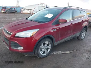 2013 Ford Escape SE with VIN 1FMCU9GX6DUA72355, listed as a IAAI auction lot 41133293 with 113,188 mi miles and . Bid and sale history available at DreamBid. Image 2.