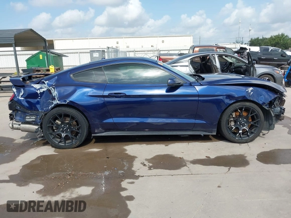2018 Ford Mustang EcoBoost z VIN 1FA6P8TH0J5104312, wystawiony jako IAAI lot #42532806 z przebiegiem 87 564 mil mil oraz . Historia ofert i sprzedaży dostępna na DreamBid. Obrazek 14.