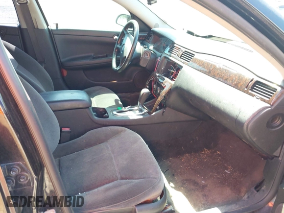 2012 Chevrolet Impala LS Retail with VIN 2G1WA5E38C1306100, listed as a IAAI auction lot 42052909 with 248,528 mi miles and . Bid and sale history available at DreamBid. Image 5.