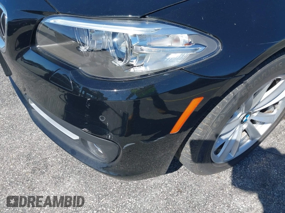 2015 BMW 5 Series 528i xDrive with VIN WBA5A7C58FG144069, listed as a IAAI auction lot 41854112 with 136,403 mi miles and . Bid and sale history available at DreamBid. Image 6.