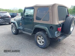 1998 Jeep Wrangler Sahara z VIN 1J4FY49SXWP716218, wystawiony jako IAAI lot #42354433 z przebiegiem 234 378 mil mil oraz . Historia ofert i sprzedaży dostępna na DreamBid. Obrazek 3.