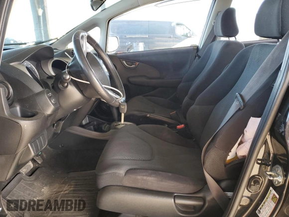 2010 Honda Fit Sport with VIN JHMGE8H46AS027813, listed as a Copart auction lot 52589035 with 212,672 mi miles and Salvage Title. Bid and sale history available at carsss.com. Image 7.