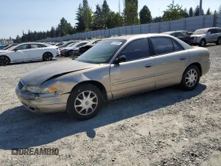 1999 Buick Regal LS with VIN 2G4WB52K8X1624610, listed as a Copart auction lot 64716284 with 106,902 mi miles and Salvage Title. Bid and sale history available at carsss.com. Image 1.