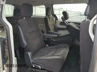 2014 Dodge Grand Caravan SXT z VIN 2C4RDGCG1ER214411, wystawiony jako Copart lot #55497065 z przebiegiem 176 662 mil mil oraz Czysty tytuł • Clean title. Historia ofert i sprzedaży dostępna na DreamBid. Obrazek 11.