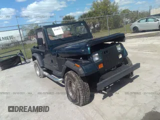 1995 Jeep Wrangler S with VIN 1J4FY19P4SP207049, listed as a IAAI auction lot 41315322 with 12,454 mi miles. Bid and sale history available at carsss.com. Image 1.