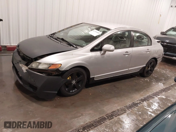 2009 Honda Civic LX z VIN 2HGFA16559H320179, wystawiony jako IAAI lot #41793459 z przebiegiem 172 878 mil mil oraz . Historia ofert i sprzedaży dostępna na DreamBid. Obrazek 17.
