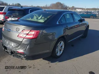 2015 Ford Taurus SE with VIN 1FAHP2D89FG134151, listed as a IAAI auction lot 41750681 with 102,348 mi miles and . Bid and sale history available at carsss.com. Image 4.