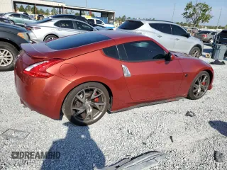 2013 Nissan 370Z with VIN JN1AZ4EH5DM382852, listed as a Copart auction lot 51109385 with 106,940 mi miles and Salvage Title. Bid and sale history available at carsss.com. Image 3.