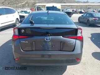 2021 Toyota Prius L Eco with VIN JTDKAMFU4M3144985, listed as a IAAI auction lot 42443957 with 20,816 mi miles and . Bid and sale history available at DreamBid. Image 16.