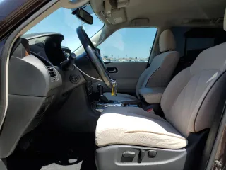 2017 Nissan Armada Platinum z VIN JN8AY2ND4H9006836, wystawiony jako Copart lot #51253595 z przebiegiem 149 729 mil mil oraz Szkoda całkowita • Salvage title. Historia ofert i sprzedaży dostępna na DreamBid. Obrazek 7.