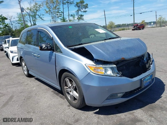 2013 Honda Odyssey Touring with VIN 5FNRL5H94DB069716, listed as a IAAI auction lot 41901369 with 243,492 mi miles. Bid and sale history available at carsss.com. Image 1.