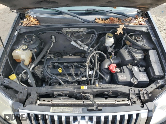 2009 Mercury Mariner Premier z VIN 4M2CU87719KJ20338, wystawiony jako Copart lot #42972595 z przebiegiem 148 871 mil mil oraz Szkoda całkowita • Salvage title. Historia ofert i sprzedaży dostępna na DreamBid. Obrazek 12.