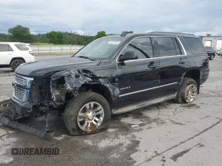 2015 Chevrolet Tahoe LT with VIN 1GNSKBKC1FR610409, listed as a Copart auction lot 60222745 with 166,194 mi miles and Salvage title. Bid and sale history available at DreamBid. Image 1.