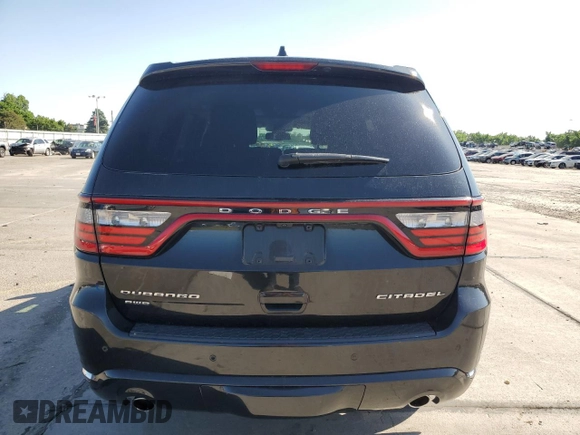 2016 Dodge Durango Citadel with VIN 1C4RDJEG6GC341421, listed as a Copart auction lot 61680215 with 77,024 mi miles and Salvage title. Bid and sale history available at DreamBid. Image 6.