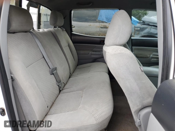 2011 Toyota Tacoma PreRunner z VIN 3TMJU4GN1BM124215, wystawiony jako Copart lot #55755385 z przebiegiem 153 806 mil mil oraz Czysty tytuł • Clean title. Historia ofert i sprzedaży dostępna na DreamBid. Obrazek 10.