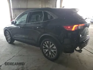 2020 Ford Escape Titanium Hybrid z VIN 1FMCU9DZ2LUB49050, wystawiony jako Copart lot #42517525 z przebiegiem 66 890 mil mil oraz Szkoda całkowita • Salvage title. Historia ofert i sprzedaży dostępna na DreamBid. Obrazek 2.