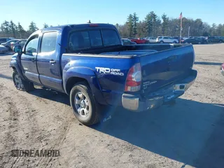 2014 Toyota Tacoma with VIN 3TMLU4EN5EM140028, listed as a IAAI auction lot 40965372 with 94,372 mi miles and . Bid and sale history available at DreamBid. Image 3.