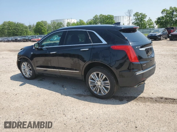 2019 Cadillac XT5 Premium Luxury AWD with VIN 1GYKNFRS9KZ232297, listed as a Copart auction lot 60241095 with 88,955 mi miles and Salvage title. Bid and sale history available at DreamBid. Image 2.