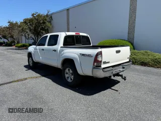 2013 Toyota Tacoma with VIN 5TFLU4EN1DX063442, listed as a Copart auction lot 62521295 with 211,682 mi miles and Clean title. Bid and sale history available at DreamBid. Image 3.