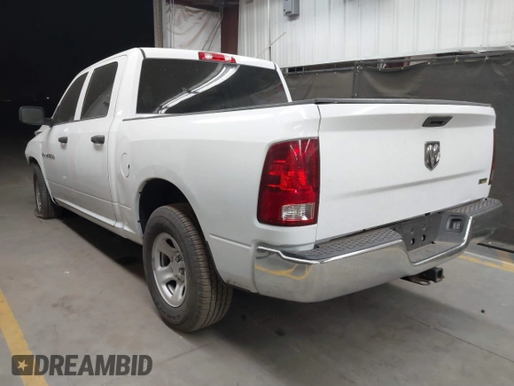 2012 Ram 1500 Tradesman with VIN 1C6RD6KP2CS280836, listed as a IAAI auction lot 40880119 with 84,748 mi miles and . Bid and sale history available at DreamBid. Image 3.