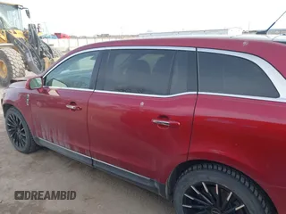 2014 Lincoln MKT EcoBoost with VIN 2LMHJ5ATXEBL58430, listed as a IAAI auction lot 41657571 with 58,502 mi miles and . Bid and sale history available at DreamBid. Image 14.