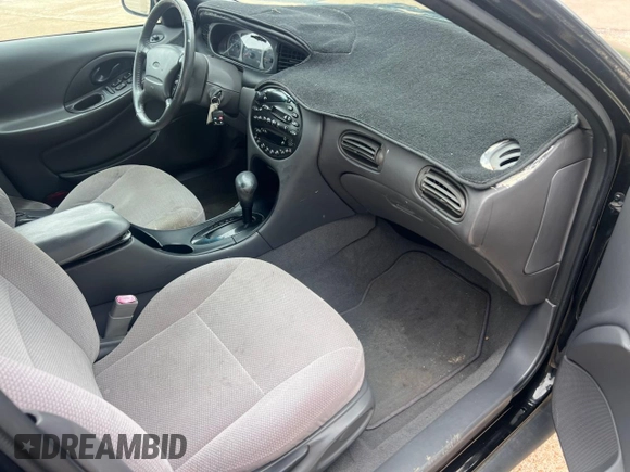 1999 Ford Taurus SE with VIN 1FAFP53SXXA145301, listed as a Copart auction lot 60351535 with 57,262 mi miles and Clean title. Bid and sale history available at DreamBid. Image 5.