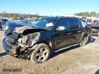 2012 Chevrolet Suburban LT with VIN 1GNSCJE06CR328478, listed as a IAAI auction lot 41339274 with 339,974 mi miles. Bid and sale history available at carsss.com. Image 2.