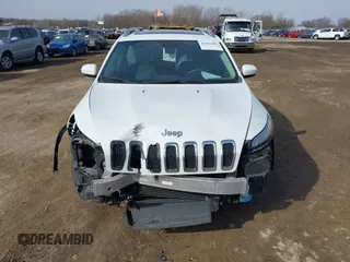 2014 Jeep Cherokee Limited with VIN 1C4PJMDS1EW277677, listed as a IAAI auction lot 41804993 with 55,010 mi miles and . Bid and sale history available at DreamBid. Image 12.