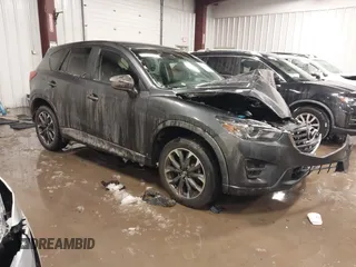 2016 Mazda CX-5 Grand Touring with VIN JM3KE2DY8G0606041, listed as a IAAI auction lot 41608671 with 48,577 mi miles. Bid and sale history available at carsss.com. Image 1.