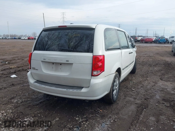 2014 Dodge Grand Caravan SE with VIN 2C4RDGBG9ER283848, listed as a IAAI auction lot 41666021 with 120,351 mi miles and . Bid and sale history available at DreamBid. Image 4.
