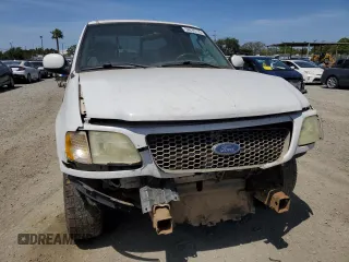 2003 Ford F-150 XL with VIN 2FTRX17213CA05950, listed as a Copart auction lot 54435115 with 310,503 mi miles and Salvage title. Bid and sale history available at DreamBid. Image 5.