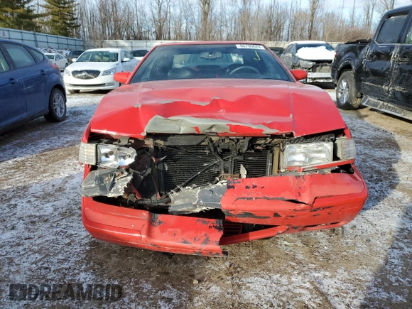 2002 Cadillac Eldorado z VIN 1G6EC12972B106132, wystawiony jako Copart lot #86799624 z przebiegiem 75 334 mil mil oraz Szkoda całkowita • Salvage title. Historia ofert i sprzedaży dostępna na DreamBid. Obrazek 5.