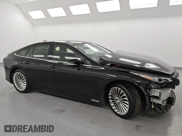 2021 Toyota Mirai XLE with VIN JTDAAAAA1MA002130, listed as a Copart auction lot 52319235 with 34,438 mi miles and Salvage title. Bid and sale history available at DreamBid. Image 4.