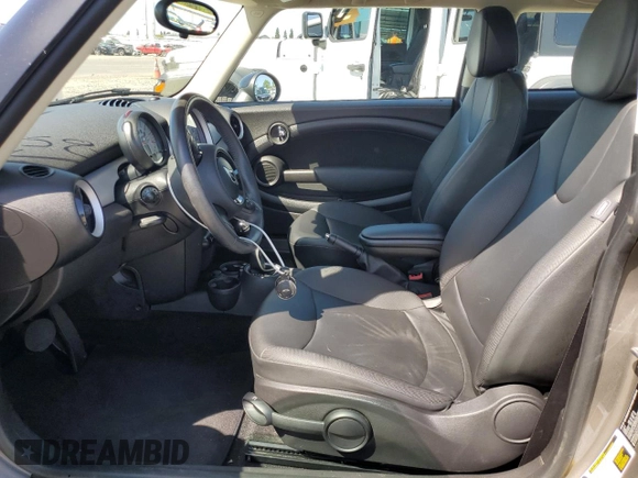 2013 MINI Hardtop with VIN WMWSU3C57DT678736, listed as a Copart auction lot 52586285 with 64,563 mi miles and Salvage Title. Bid and sale history available at DreamBid. Image 7.