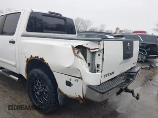 2011 Nissan Titan SL with VIN 1N6AA0EC8BN317497, listed as a IAAI auction lot 41443597 with 202,622 mi miles. Bid and sale history available at carsss.com. Image 6.