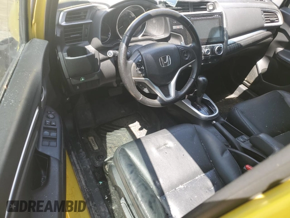 2015 Honda Fit EX-L z VIN 3HGGK5H8XFM767023, wystawiony jako Copart lot #62157155 z przebiegiem Nie podano mil oraz Szkoda całkowita • Salvage title. Historia ofert i sprzedaży dostępna na DreamBid. Obrazek 8.