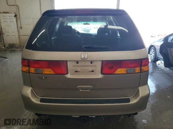 2004 Honda Odyssey LX z VIN 5FNRL18554B007005, wystawiony jako Copart lot #54377345 z przebiegiem 219 655 mil mil oraz Szkoda całkowita • Salvage title. Historia ofert i sprzedaży dostępna na DreamBid. Obrazek 6.