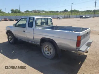 1992 Nissan Frontier SE z VIN 1N6HD16Y8NC358458, wystawiony jako Copart lot #62064905 z przebiegiem 226 678 mil mil oraz Czysty tytuł • Clean title. Historia ofert i sprzedaży dostępna na DreamBid. Obrazek 2.
