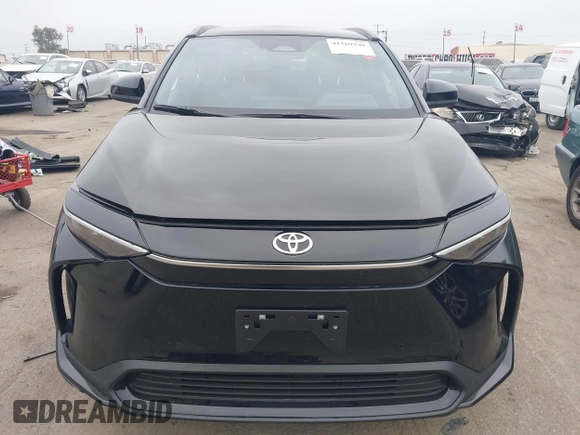 2024 Toyota bZ4X XLE with VIN JTMABACA2RA079235, listed as a IAAI auction lot 41169298 with 892 mi miles. Bid and sale history available at carsss.com. Image 13.