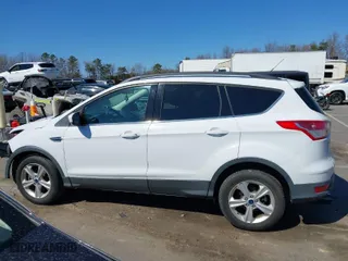 2016 Ford Escape SE with VIN 1FMCU9GX9GUC01189, listed as a IAAI auction lot 41754503 with 115,302 mi miles. Bid and sale history available at carsss.com. Image 14.