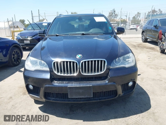 2013 BMW X5 xDrive50i with VIN 5UXZV8C5XD0C15908, listed as a IAAI auction lot 42536233 with 190,627 mi miles and . Bid and sale history available at DreamBid. Image 6.