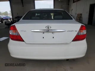 2002 Toyota Camry LE z VIN 4T1BE32K82U108626, wystawiony jako Copart lot #59215024 z przebiegiem Nie podano mil oraz Szkoda całkowita • Salvage title. Historia ofert i sprzedaży dostępna na DreamBid. Obrazek 6.