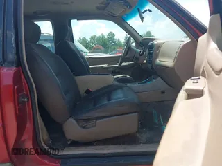 2001 Ford Explorer Sport z VIN 1FMYU60E01UC40242, wystawiony jako IAAI lot #42727329 z przebiegiem 278 655 mil mil oraz . Historia ofert i sprzedaży dostępna na DreamBid. Obrazek 5.
