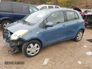2009 Toyota Yaris with VIN JTDKT903195255240, listed as a IAAI auction lot 41650800 with 168,991 mi miles. Bid and sale history available at carsss.com. Image 17.