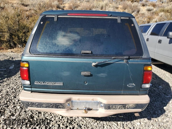 1996 Ford Explorer XL z VIN 1FMDU34X4TZA70403, wystawiony jako Copart lot #76780834 z przebiegiem 131 020 mil mil oraz Tytuł czysty. Historia ofert i sprzedaży dostępna na DreamBid. Obrazek 6.