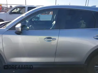 2020 Mazda CX-5 Touring with VIN JM3KFACM1L0789394, listed as a IAAI auction lot 41565887 with 73,730 mi miles. Bid and sale history available at carsss.com. Image 15.