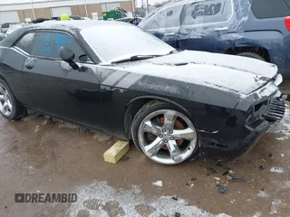 2013 Dodge Challenger R/T with VIN 2C3CDYBT4DH549469, listed as a IAAI auction lot 41532838 with 166,824 mi miles. Bid and sale history available at carsss.com. Image 1.