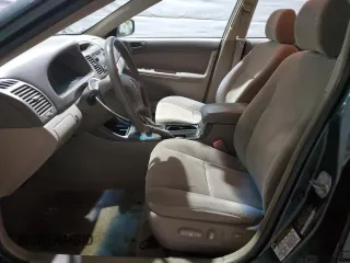 2004 Toyota Camry LE z VIN 4T1BE32K74U311882, wystawiony jako Copart lot #47997235 z przebiegiem 205 299 mil mil oraz Szkoda całkowita • Salvage title. Historia ofert i sprzedaży dostępna na DreamBid. Obrazek 7.